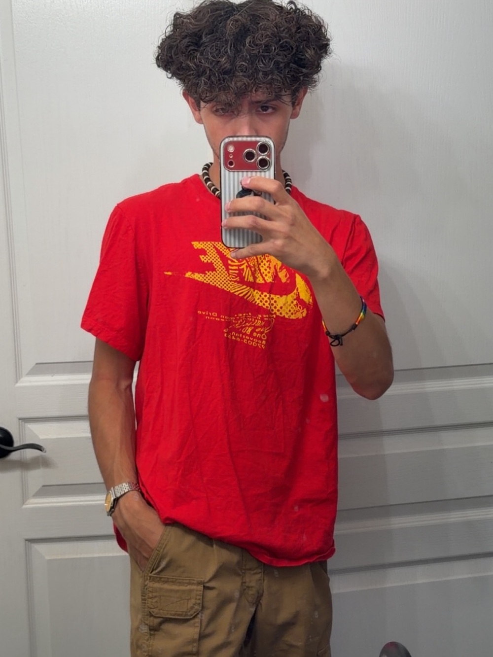Nike Red Tee with Yellow Swoosh Graphic